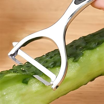 Épluches légumes pèle un concombre