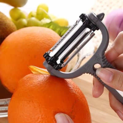 Éplucheur à julienne 3 en 1 pèle une orange