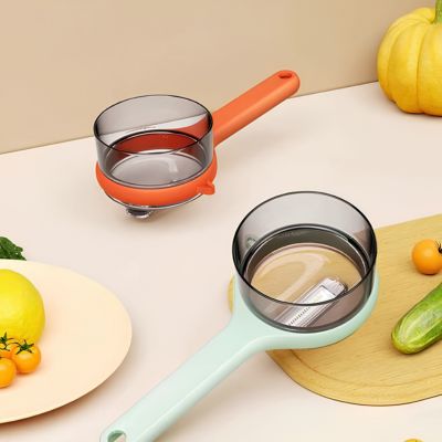 Éplucheur à légumes réservoir orange