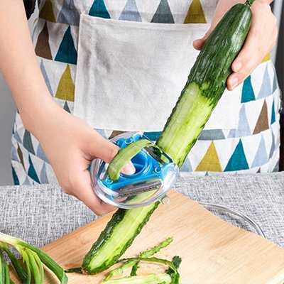 Éplucheur à légumes triple lames pèle un concombre