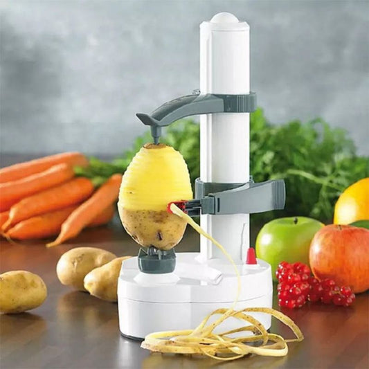 Eplucheur electrique pèle une pomme de terre