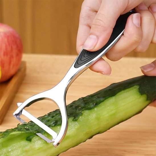 Éplucheuse légumes métallique épluche un concombre