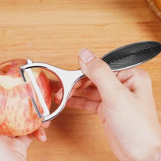 Éplucheuse légumes métallique pèle une pomme