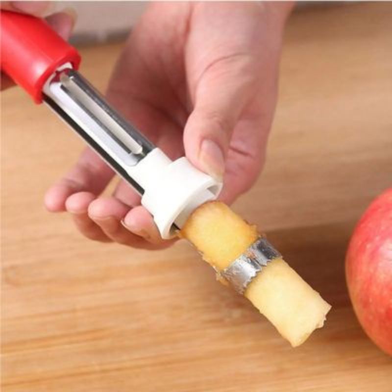 Vide pomme à manche rouge éjecte coeur de pomme