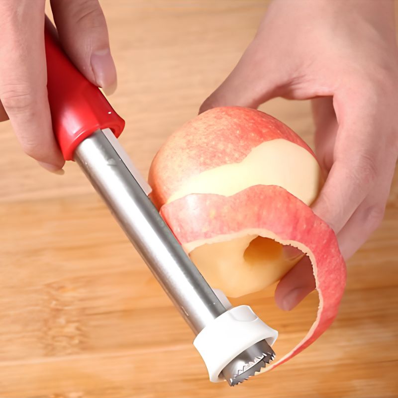 Vide pomme à manche rouge utilisé par homme