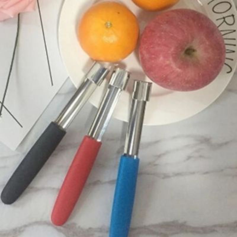 Vide pommes bleu présenté à côté de fruits